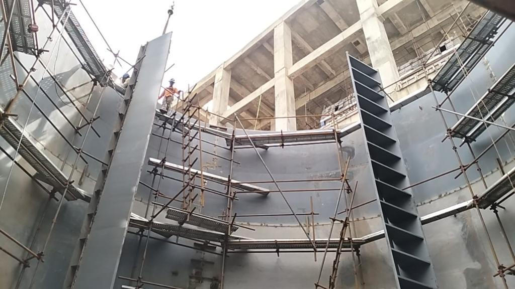 6-Tank Cluster Aerial View with Workers
